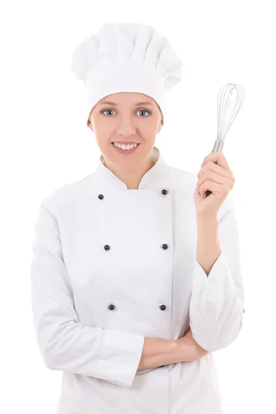 Jovem mulher feliz no chef uniforme com batedor isolado no branco — Fotografia de Stock