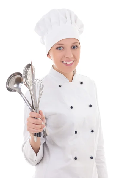 Young woman in chef uniform with kitchen equipment isolated on w — Stock Photo, Image