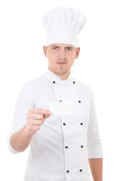 Jonge man chef-kok in uniforme weergegeven: blanco visitekaartje geïsoleerd — Stockfoto