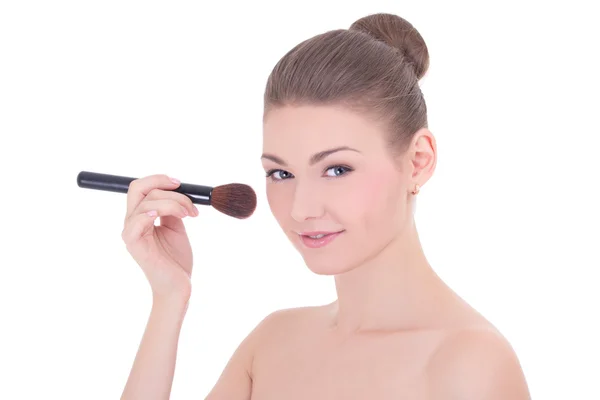 Portrait of young beautiful woman applying rouge or powder with — Stock Photo, Image