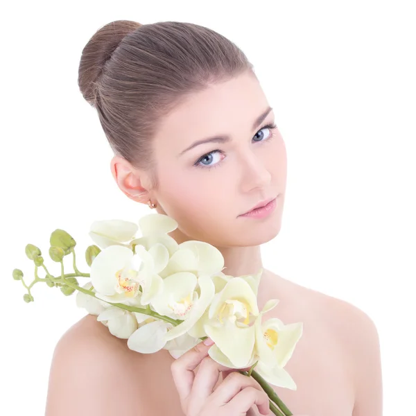 Retrato de uma jovem mulher bonita com flor orquídea isolada na — Fotografia de Stock