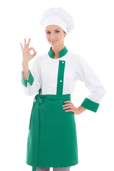 Mujer joven chef mostrando signo bien aislado en blanco — Foto de Stock