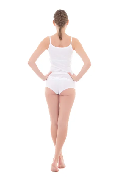 Bakifrån av ung smal kvinna i bomull underkläder isolerad på wh — Stockfoto