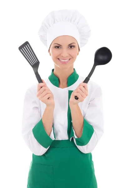 Lycklig kvinna i kock enhetlig med köksredskap isolerad på vit — Stockfoto