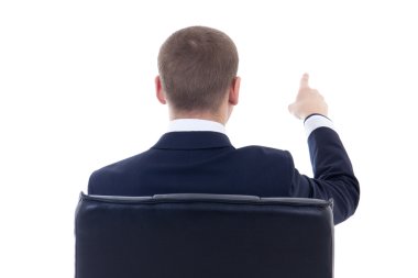 arkadan görünüşü office sandalyede oturan ve işaret iş adamı bir