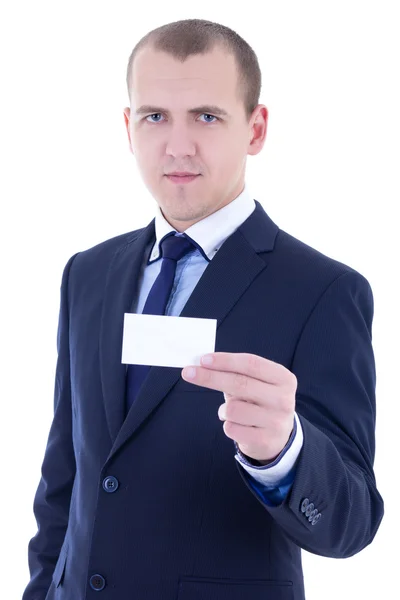 Young businessman in suit holding business card isolated on whit — Stock Photo, Image