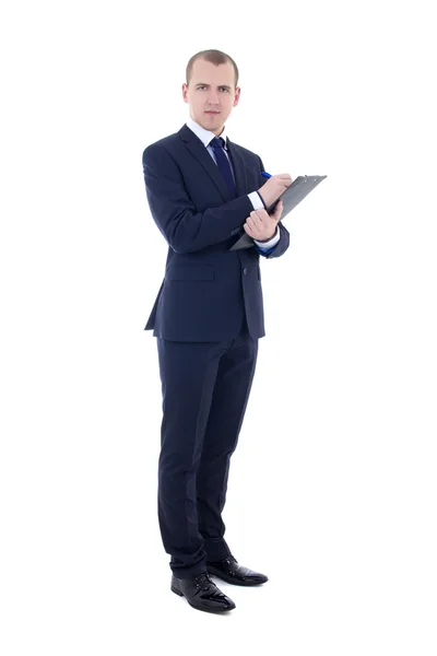 Full längd porträtt av ung affärsman i kostym med penna och c — Stockfoto