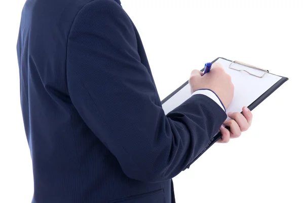 Pen and clipboard in young businessman's hands isolated on white — Stock Photo, Image