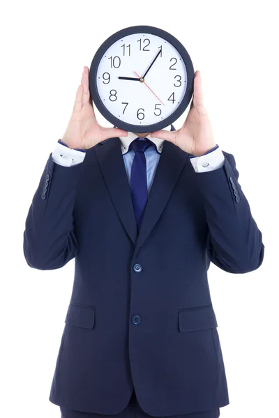 Business man in suit with clock covering face isolated on white — Stock Photo, Image