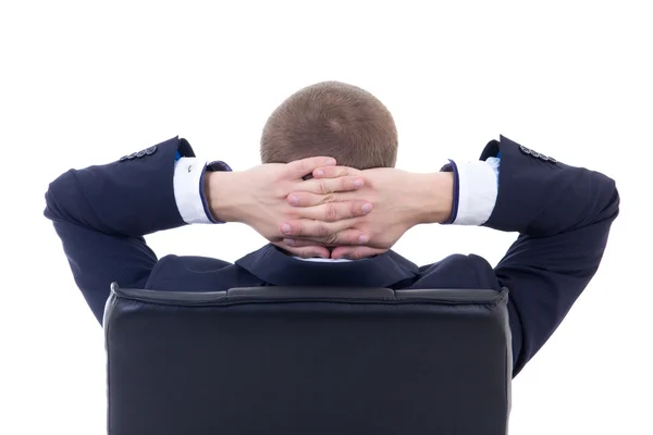Vista trasera del hombre de negocios sentado en la silla de la oficina aislada en wh — Foto de Stock