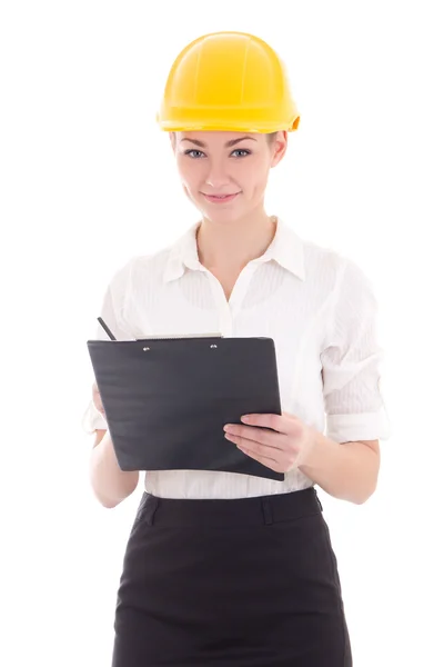 Mulher de negócios linda jovem no capacete de construtor com prancheta — Fotografia de Stock