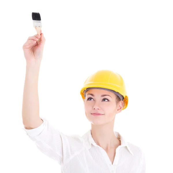 Happy business woman architect in yellow builder helmet painting — Stock Photo, Image