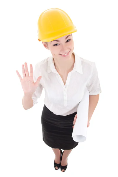 Funny business woman architect in yellow builder helmet showing — Stock Photo, Image