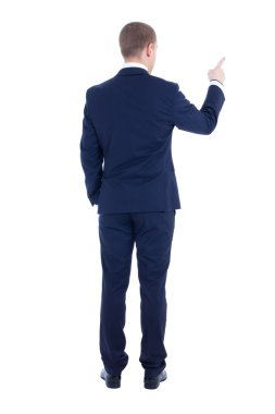 o bir şeye işaret eden genç iş adamı dikiz izole
