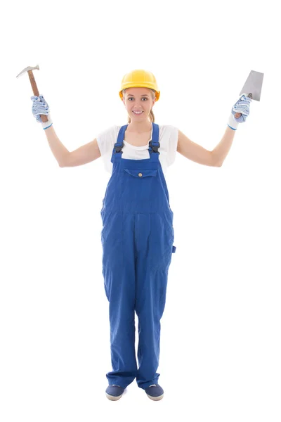 Vrouw in blauwe bouwer uniform met Troffel en hammer geïsoleerd op — Stockfoto