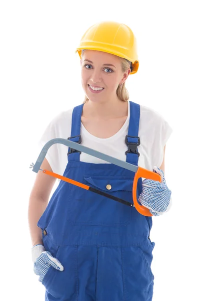 Jonge vrouw in blauwe bouwer uniform met zag geïsoleerd op wit — Stockfoto