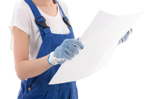 Woman in blue builder uniform holding building plan isolated on — Stock Photo, Image