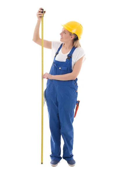 Concepto de carrera - mujer en azul constructora uniforme manteniendo la medida de t —  Fotos de Stock