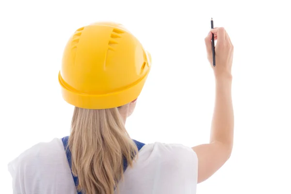 Back view of woman in blue builder uniform writing something on — Stock Photo, Image