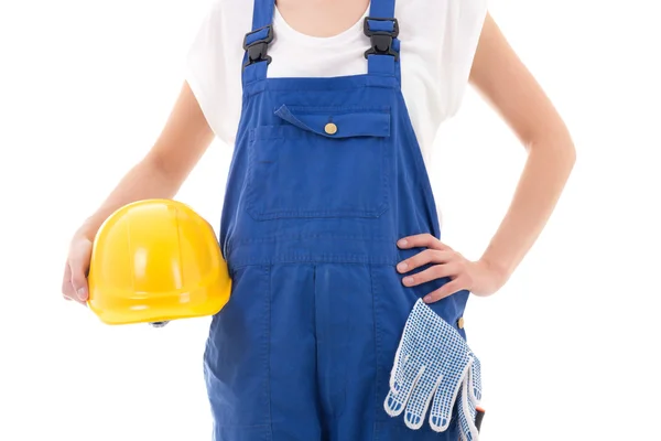 Casque de sécurité jaune dans les mains du constructeur isolé sur blanc — Photo