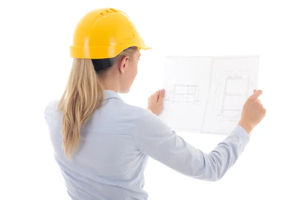 Back view of business woman in yellow builder helmet holding bui — Stock Photo, Image