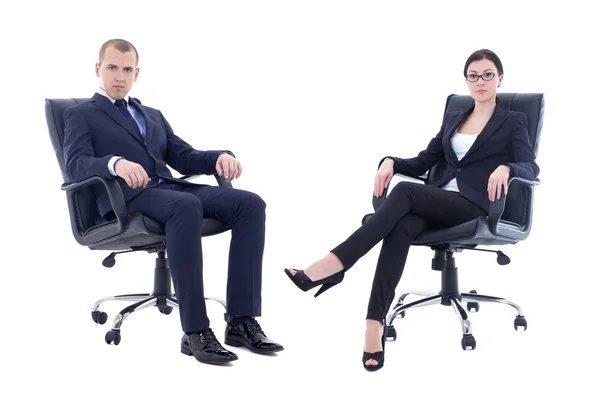 Young man and beautiful woman in business suits sitting on offic — Stock Photo, Image