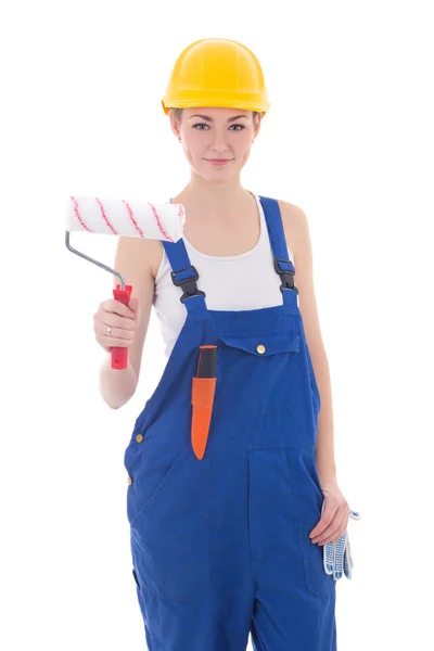 Beautiful woman painter in blue coveralls and yellow helmet isol — Stock Photo, Image