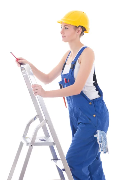 Young woman electrician in workwear with screwdriver on ladder i — Stock Photo, Image