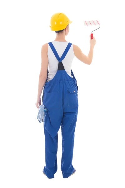 Achteraanzicht van vrouw schilder in werkkleding met penseel geïsoleerd — Stockfoto