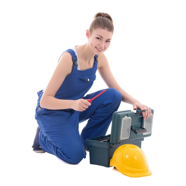 Jonge aantrekkelijke vrouw bouwer in werkkleding met toolbox geïsoleerd — Stockfoto