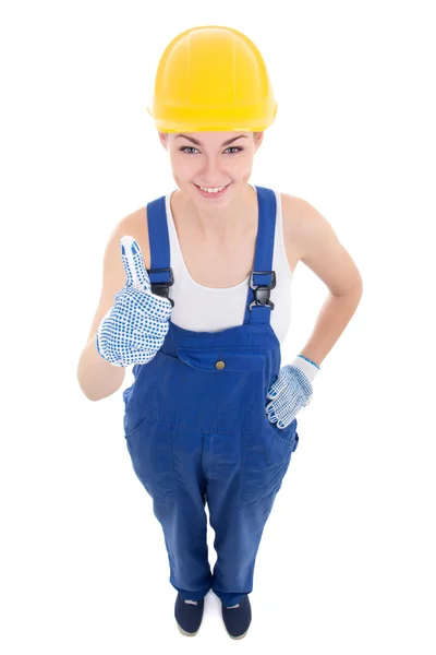 Construtor de engraçado jovem mulher atraente no sentido positivo workwear isola — Fotografia de Stock
