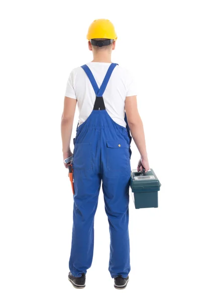 Vista do homem no Construtor uniforme e capacete com caixa de ferramentas isol traseira — Fotografia de Stock