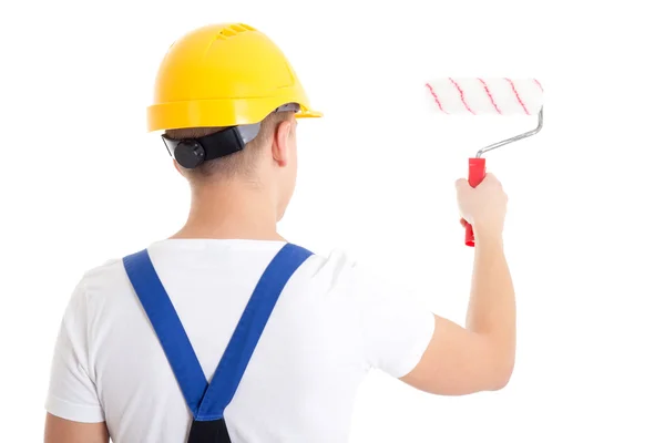 Back view of man painter in workwear with paintbrush isolated on — Stock Photo, Image