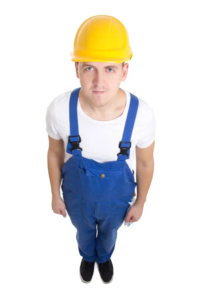 Full längd porträtt av ung vacker man builder i blå uniform — Stockfoto