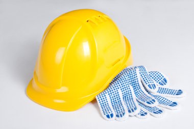 Builder's kask sarı ve üzerinde beyaz eldiven iş