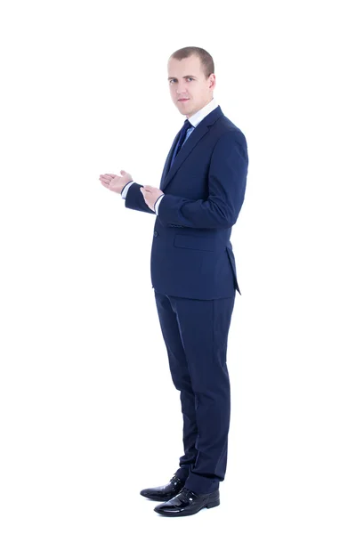 Homem de negócios bonito apresentando um copyspace isolado no branco — Fotografia de Stock