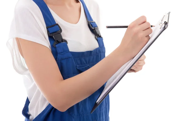 Klembord en pen in vrouw bouwer handen geïsoleerd op wit — Stockfoto