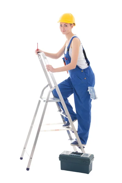 Ung kvinna builder i blå overaller med toolbox, skruvmejsel — Stockfoto