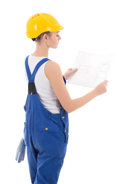 Vista posterior de constructor de mujer en guardapolvos azules sosteniendo el edificio sc —  Fotos de Stock