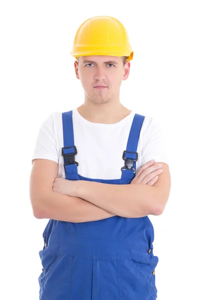 Portrait of young handsome man in blue builder uniform isolated — Stock Photo, Image