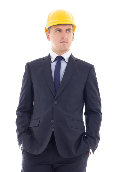 Hombre de negocios joven en casco de constructor amarillo aislado en blanco —  Fotos de Stock