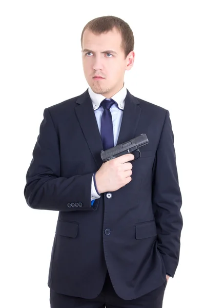 Серйозна людина в діловому костюмі з пістолетом ізольована на білому — стокове фото