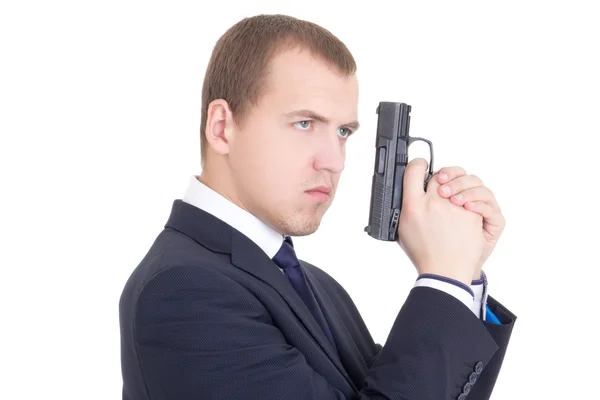 Portrait of serious man in business suit with gun isolated on wh — Stock Photo, Image