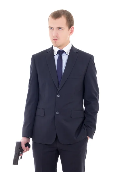 Young man in business suit with handgun isolated on white — Stock Photo, Image