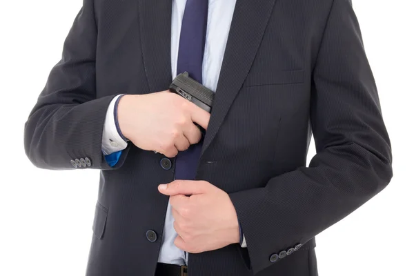Homem escondido a arma isolada no branco — Fotografia de Stock