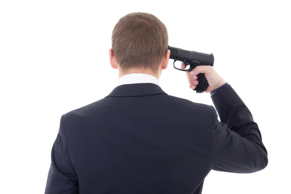 Widok człowieka biznesu z tyłu z pistoletu starając się samobójstwo isolat — Zdjęcie stockowe