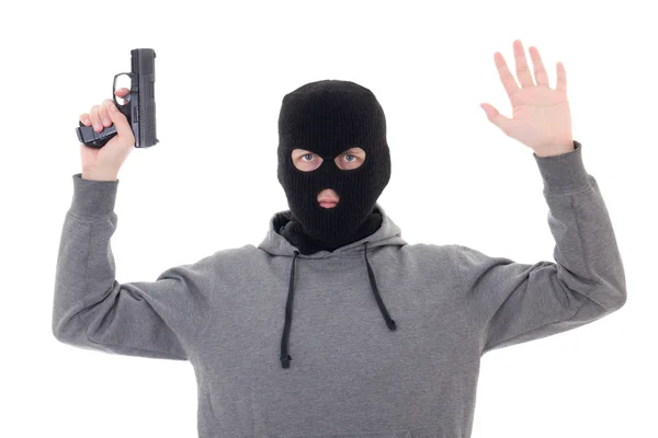 Человек в черной маске с пушкой, взявшись за руки вверх изолированные на белом — стоковое фото