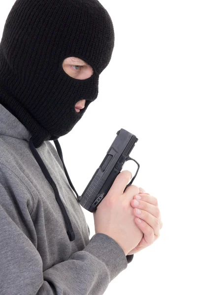 Profile view of criminal man in mask holding gun isolated on whi — Stock Photo, Image