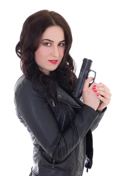 Hermosa mujer en chaqueta de cuero con pistola aislado en blanco — Foto de Stock