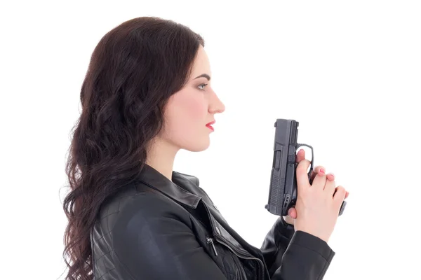 Joven mujer hermosa chaqueta de cuero con pistola aislado en whi —  Fotos de Stock